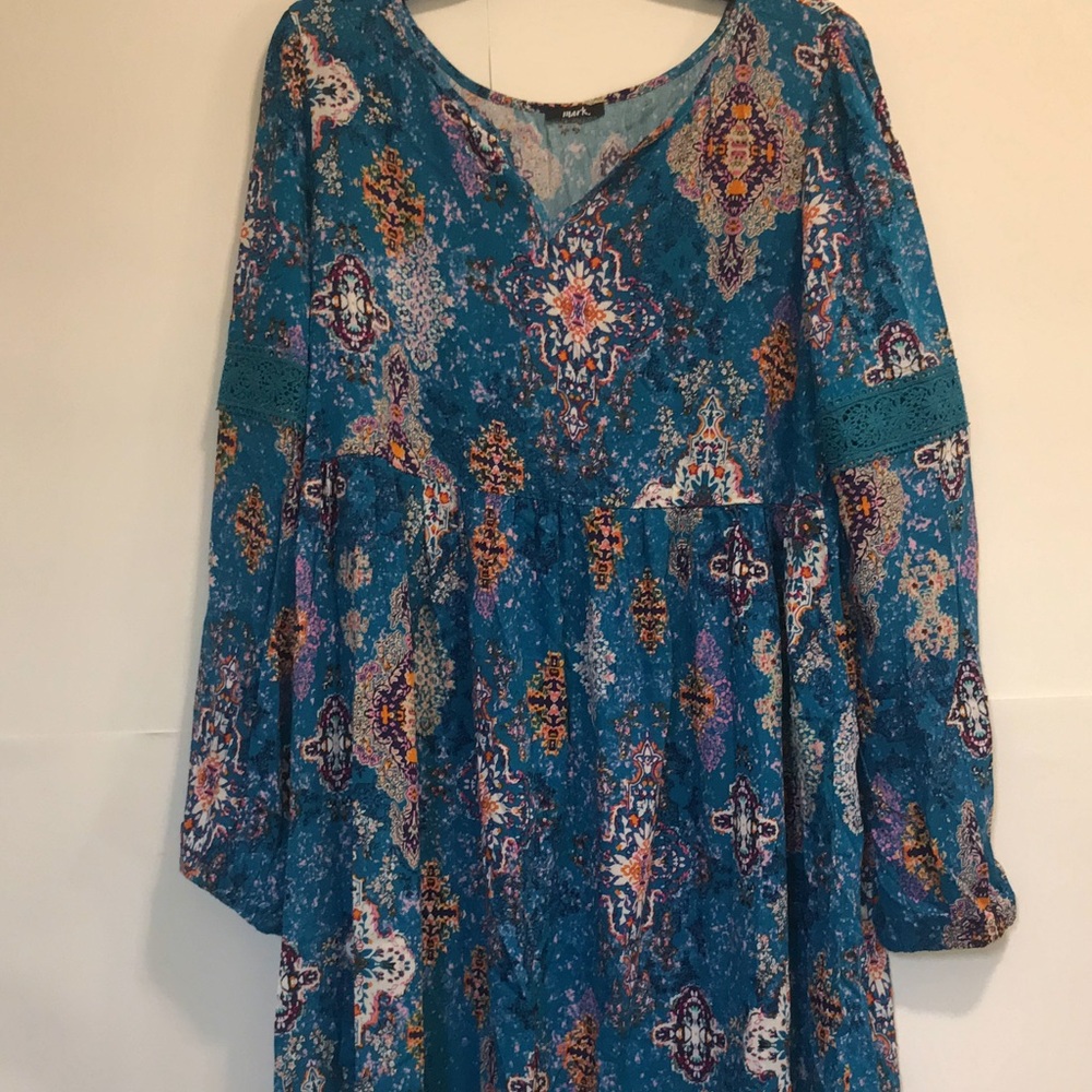 Mark. Blue dress
